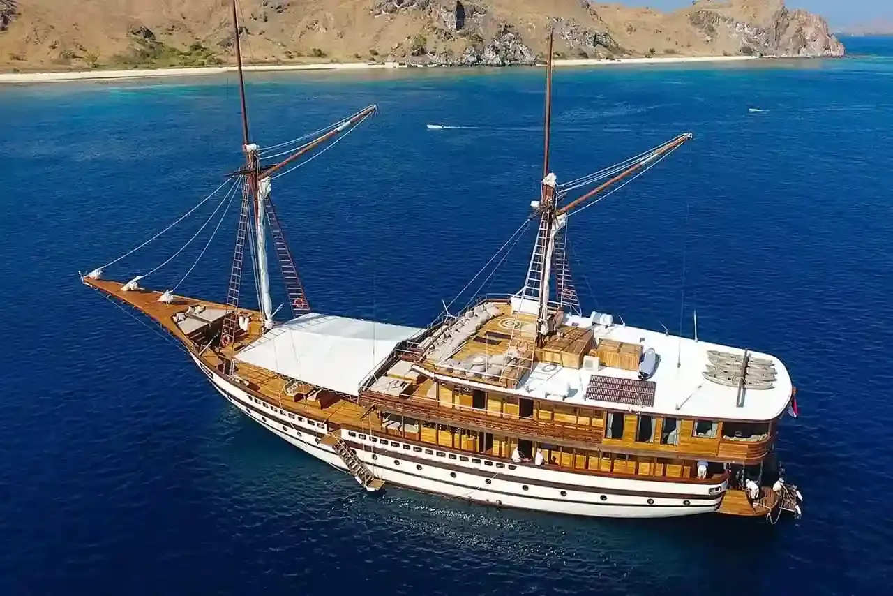 A phinisi schooner at anchor, seen from above