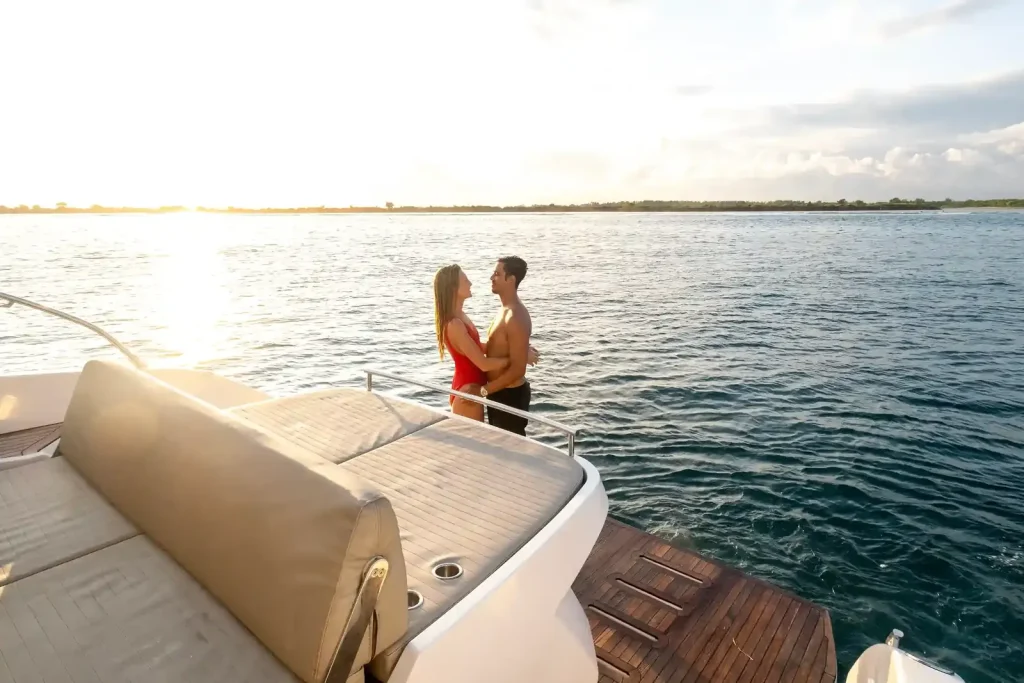 Two guests alone on the deck of a private yacht